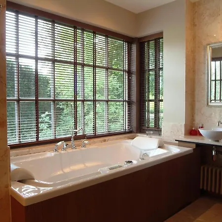 Charmehotel Manoir Ogygia 호텔