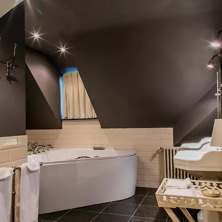 호텔 Charmehotel Manoir Ogygia 4*