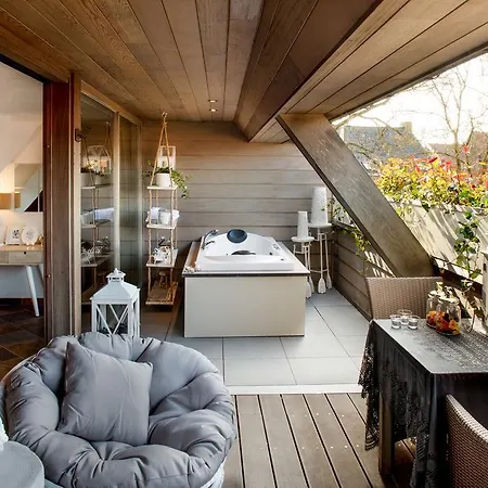 호텔 Charmehotel Manoir Ogygia 4*